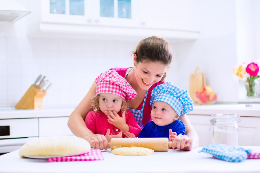 Children baking bread