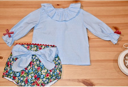 Baby girl's blouse and bloomers
