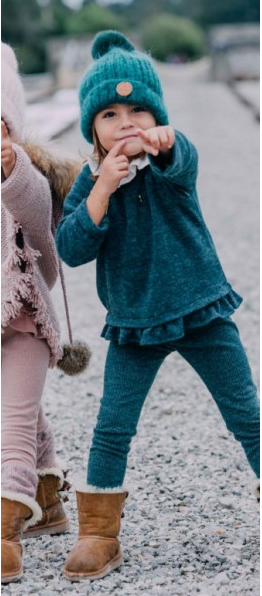 Girl's green top and trousers